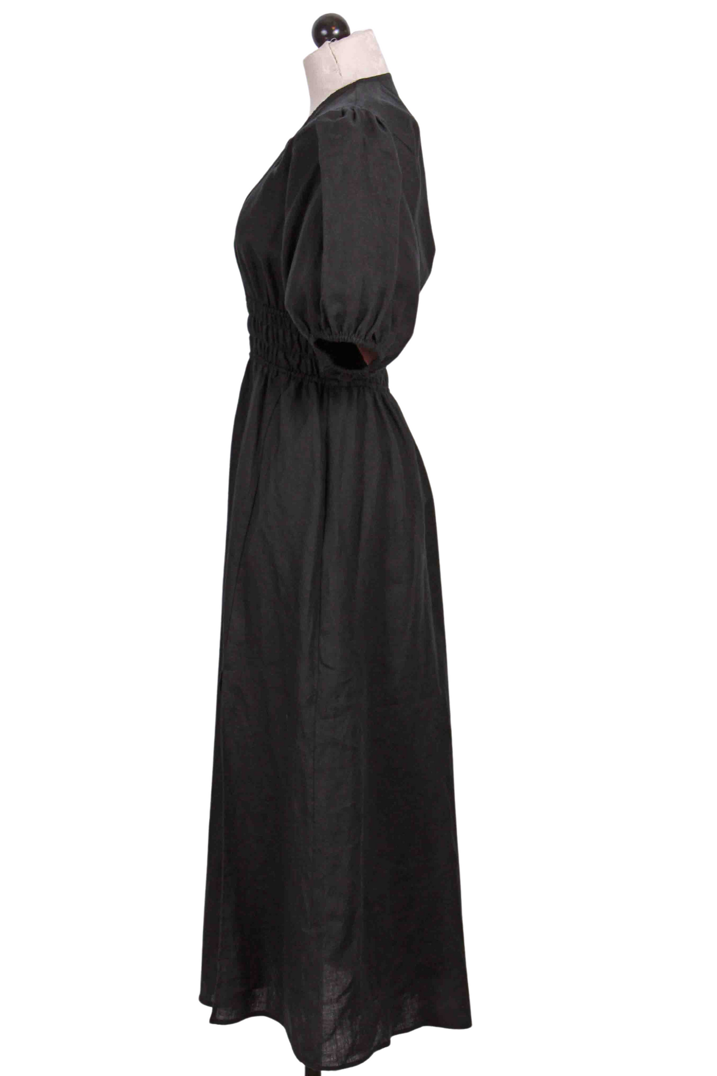 side view of Black Linen Shirred Waist Dress by Fifteen Twenty