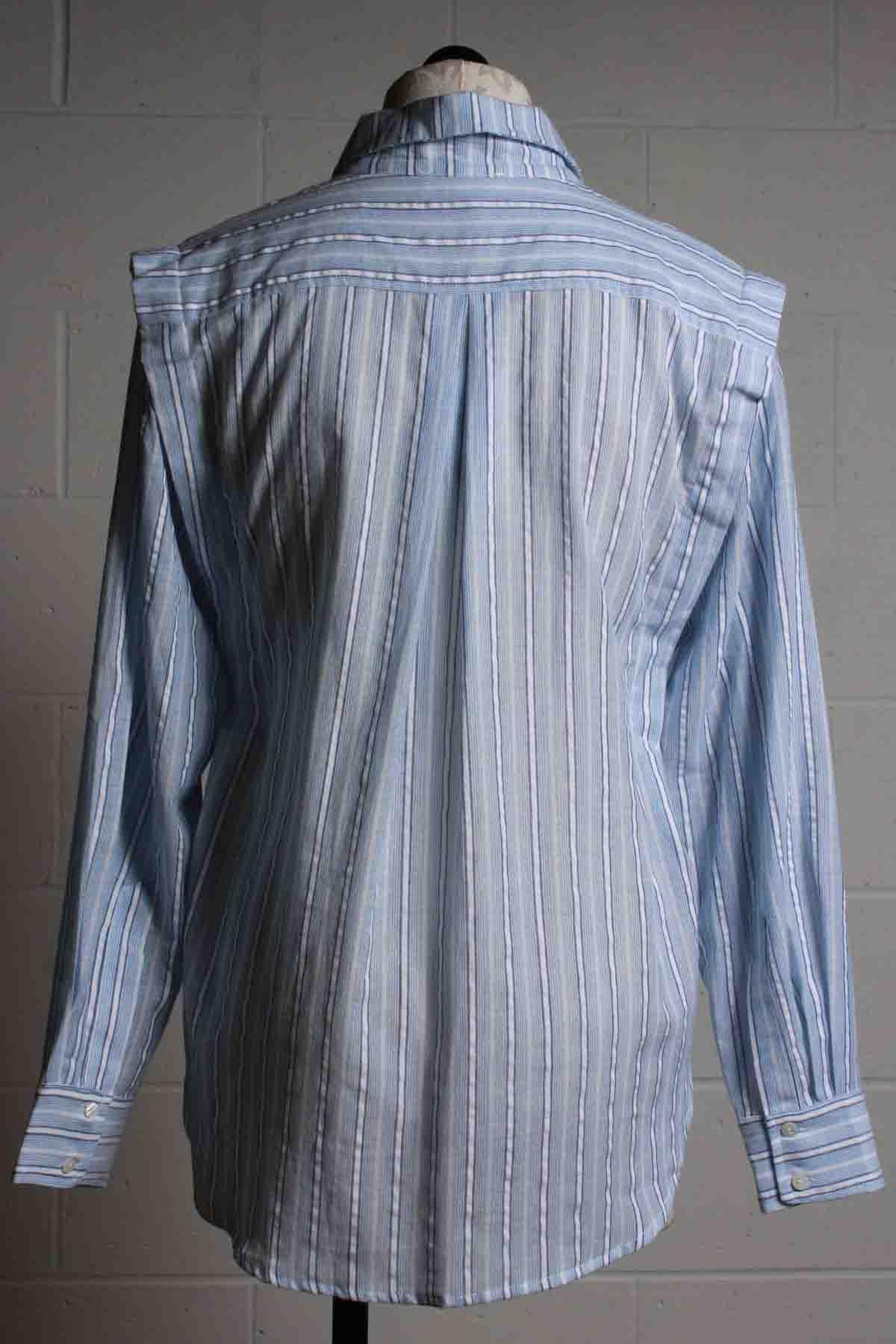 back view of Striped blue and white Lucy Button front Top by Heartloom with a pleated shoulder detail