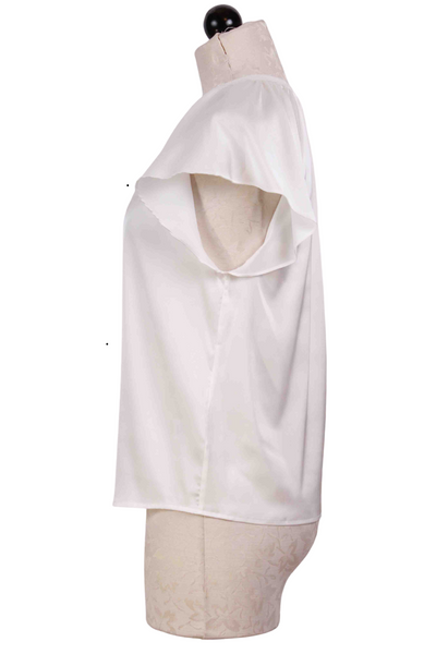 side view of White Pernilla Blouse by Generation Love with a pretty shirred neck and flutter sleeves