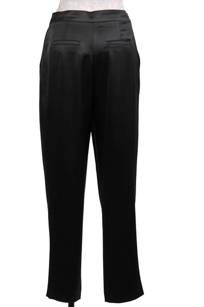 back view of Black Portia Pleated Satin Pants by Generation Love