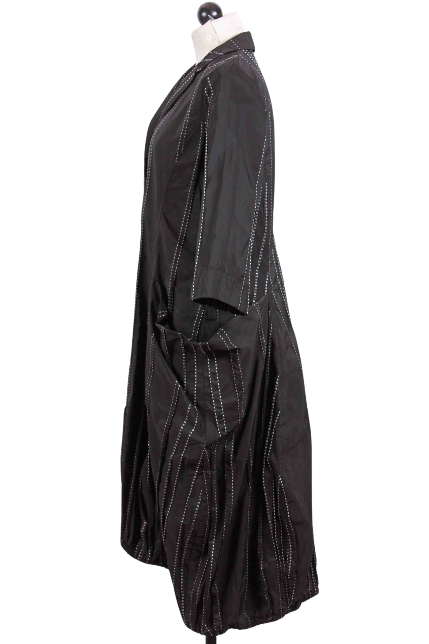 side view of black Pinstripe Jacket by Alembika with large pockets