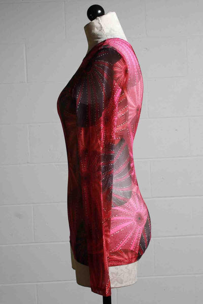 side view of Mika Sea Urchin long sleeve sheer mesh tee by Kozan that look like big red, fuschia and black Sea Urchin Shells