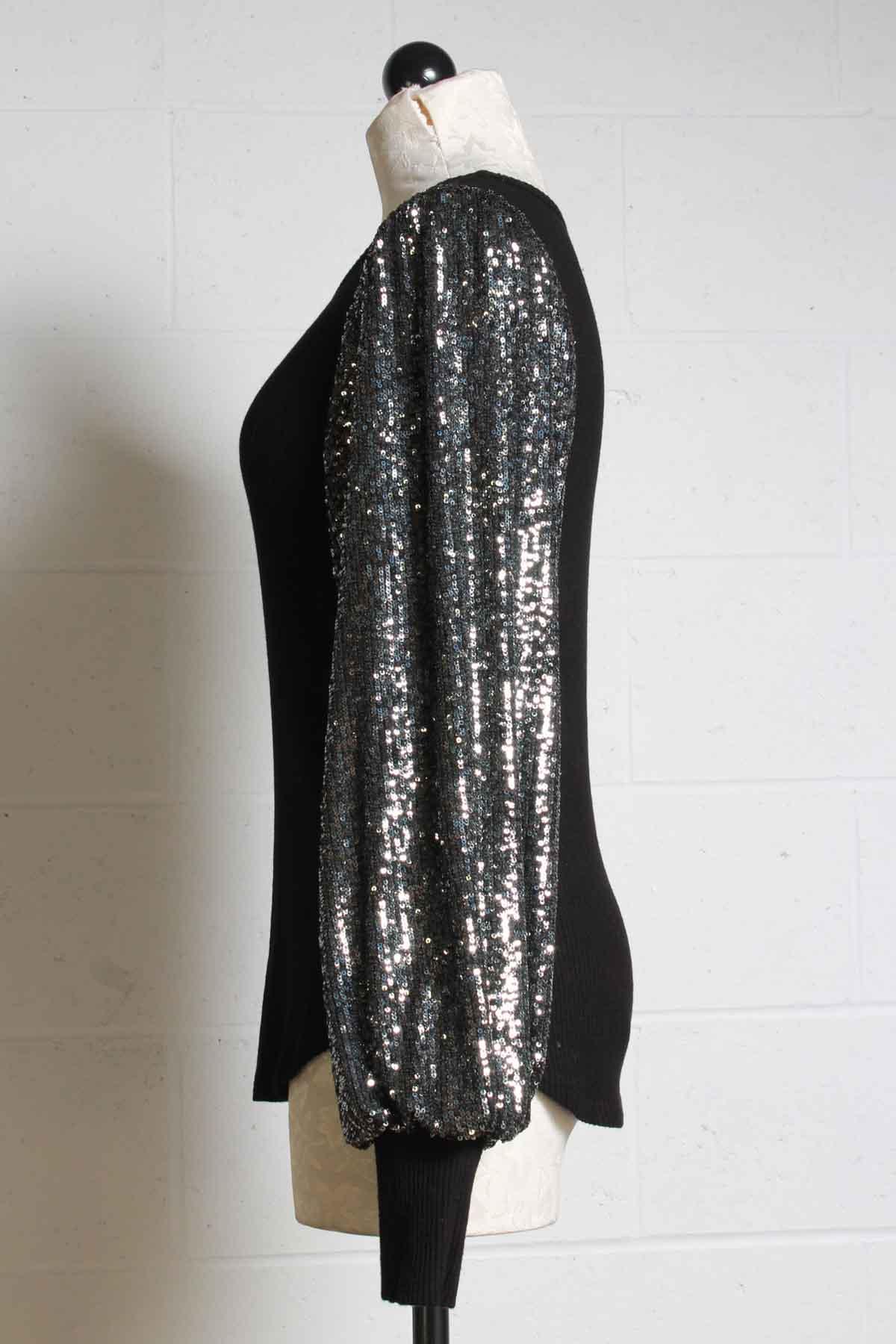 side view of black ribbed knit top by Fifteen Twenty with sequined blouson sleeves