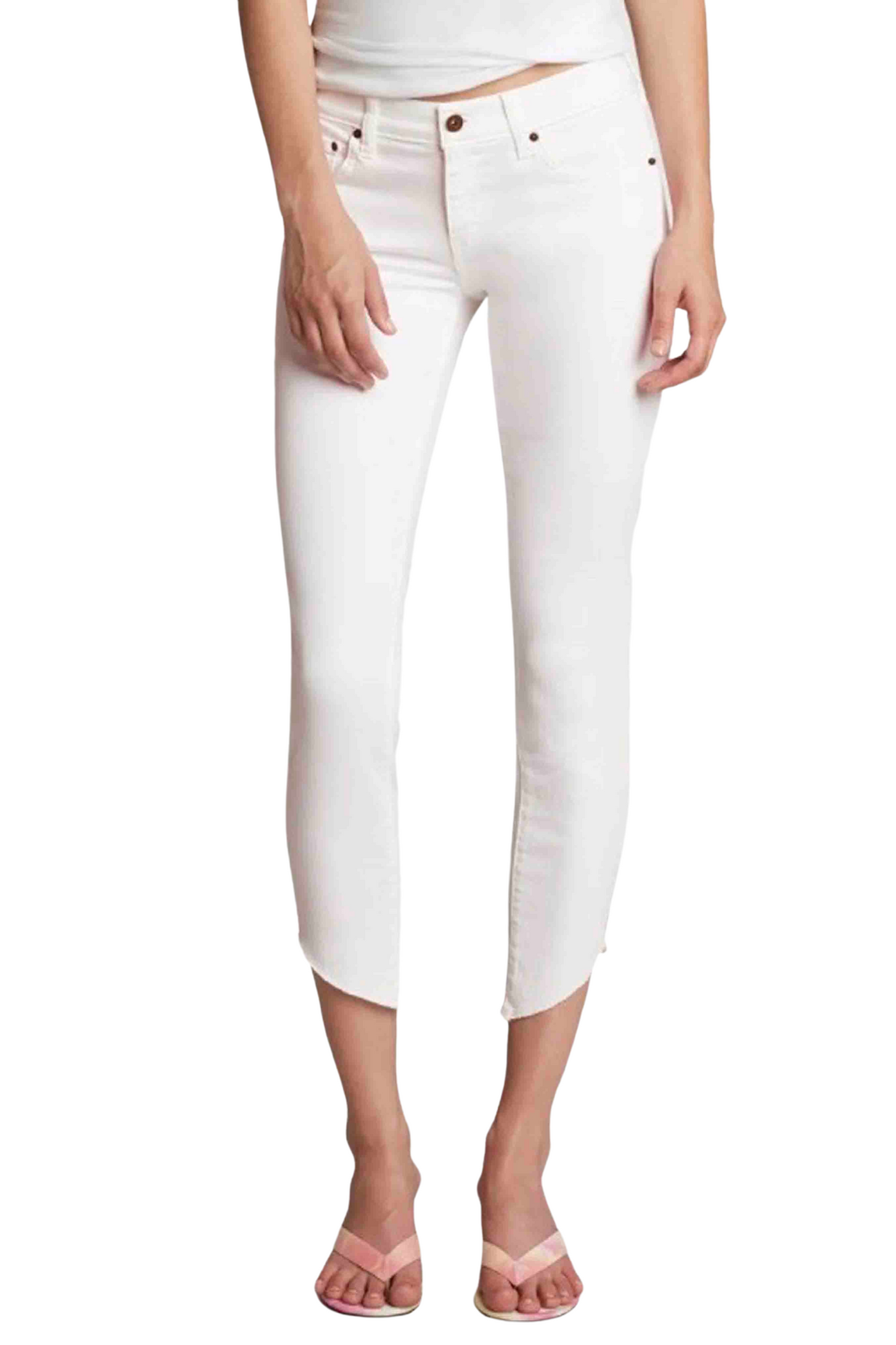 White Mid-Rise Skinny Jean by Principle Denim with asymmetrical raw hemline