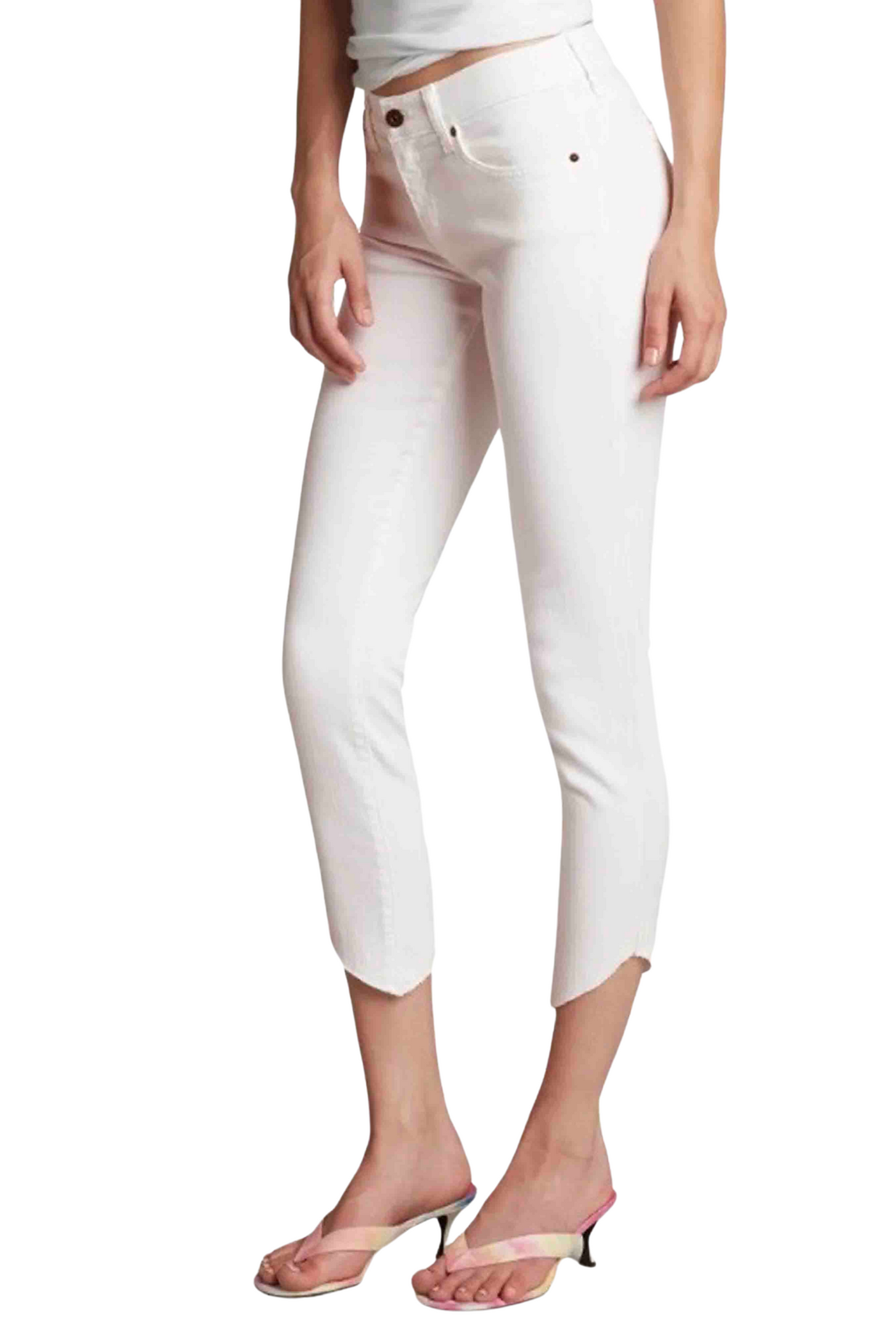 side view of White Mid-Rise Skinny Jean by Principle Denim with asymmetrical raw hemline