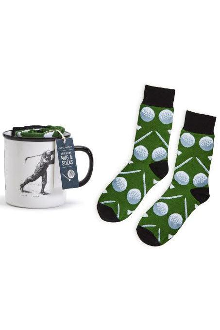 Hole-in-One Coffee Mug and pair of Golf Socks by Two's Company with a view of the socks