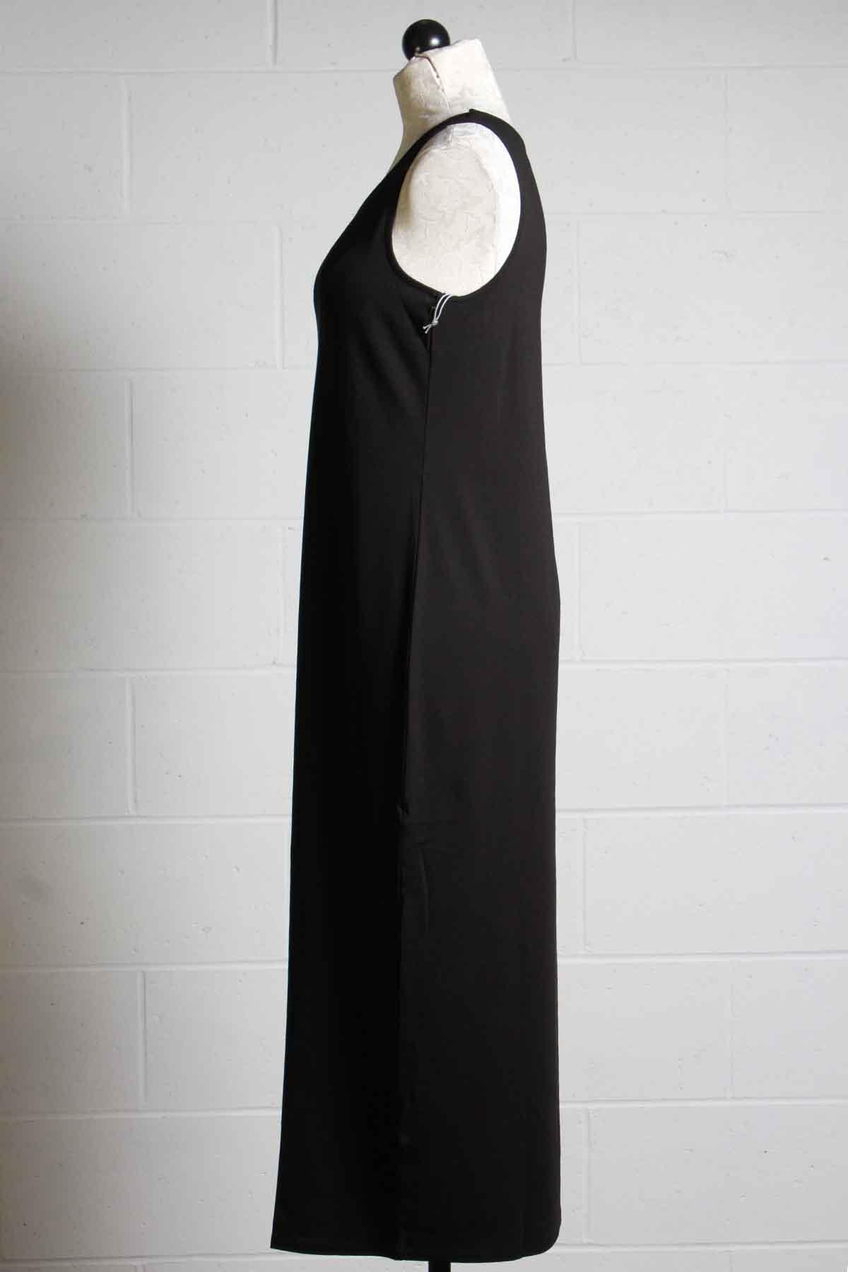 side view of Black sleeveless midi length Core travel dress by Habitat