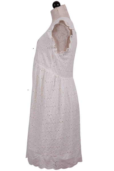 side view of white Sleeveless V Neck Eyelet Dress by Apricot with ruffle shoulders