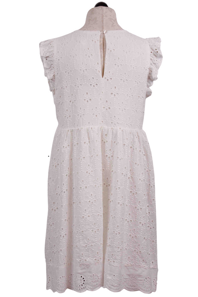 back view of white Sleeveless V Neck Eyelet Dress by Apricot with ruffle shoulders