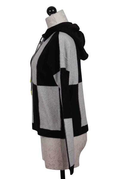 side view of Black and Silver Checked Out Hoodie by Lisa Todd
