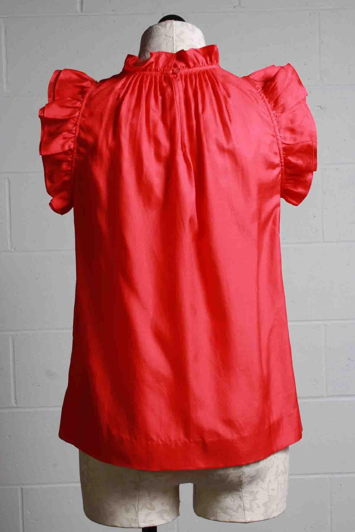 back view of Fiesta red sleeveless Emma Top by Marie Oliver with Ruffled sleeves and neck