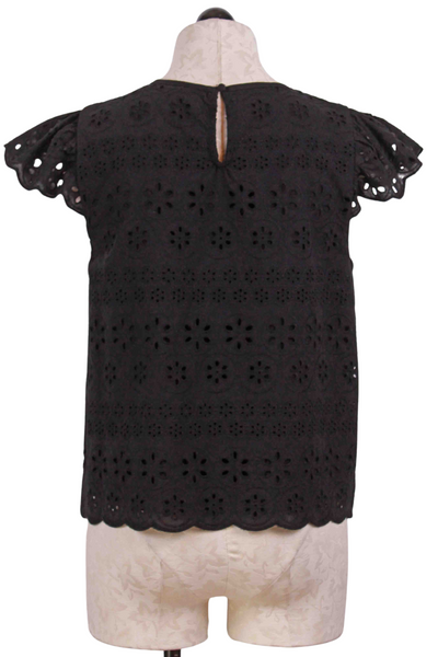 back view of Black Cropped Sleeveless Eyelet Top by Apricot with Ruffled Shoulders