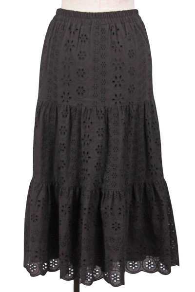 back view of black Tiered Eyelet Midi Length Skirt by Apricot with an elastic waist