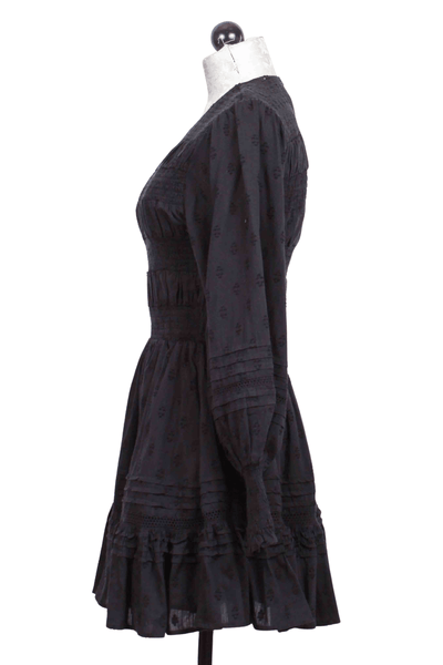 side view of black Smocked Bodice Long Sleeve Daniella Mini Dress by Cleobella