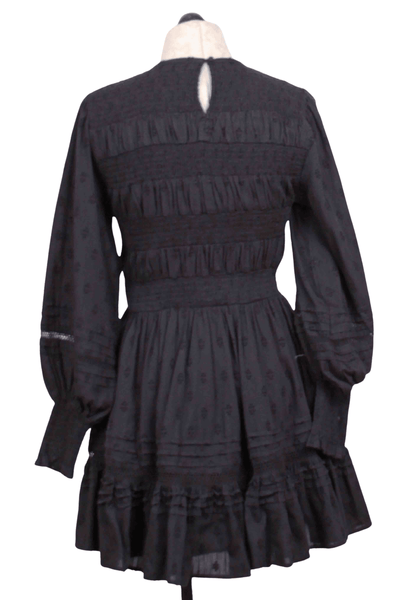 back view of black Smocked Bodice Long Sleeve Daniella Mini Dress by Cleobella