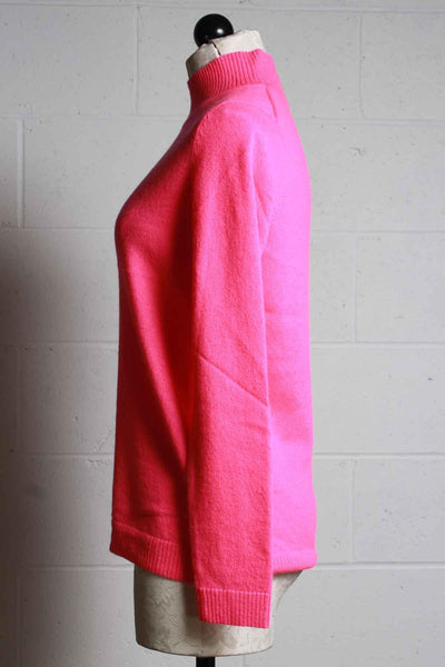 side view of shocking pink cashmere mock turtleneck by Edinburgh Knitwear