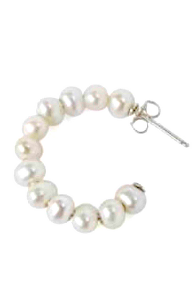 A classic hoop earring by Chan Luu in a white pearl