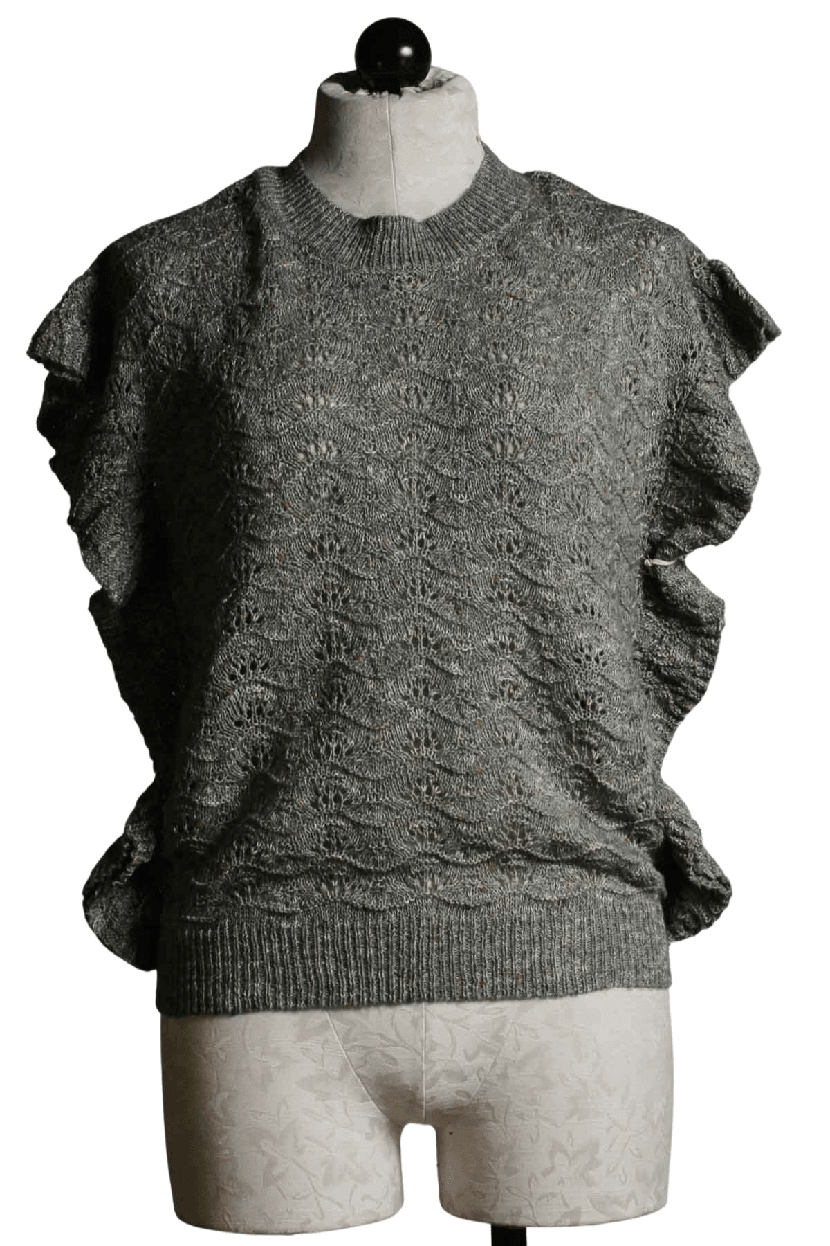 sleeveless seafoam green pointelle sweater by Another Love with a ruffle down the sides and arms