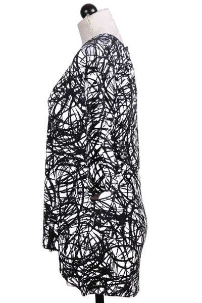 side view of black and white Circle Print Top by Nally and Millie