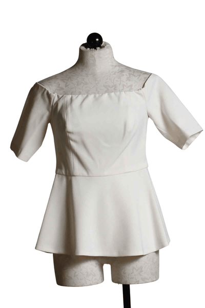ivory Elegant fitted Off the shoulder Forbid Top by Trina Turk with a peplum bottom