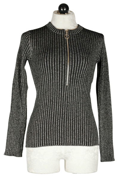  half zip with a gold-O ring zipper, this slim fitting fine ribbed black with gold sweater