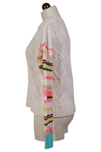side view of snow Knit Wit Sweater by Lisa Todd
