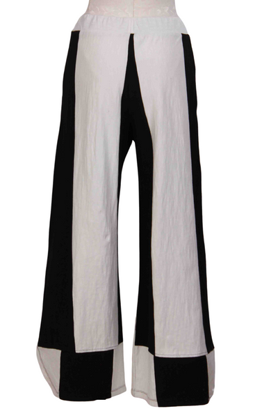 back view of Black and White Wide Vertical Striped Pant by Alembika