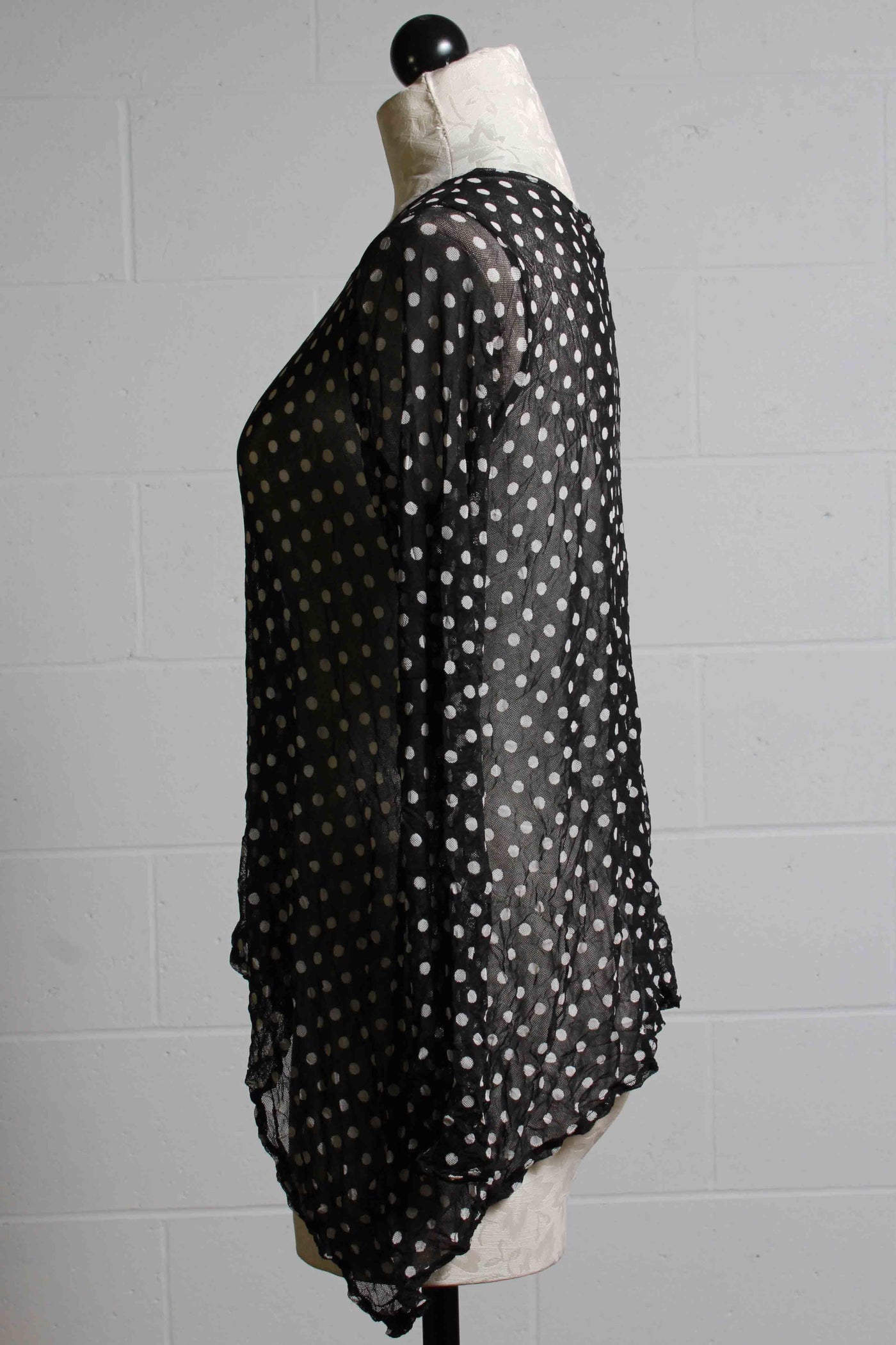 side view of Long Sleeve Black and White Polka Dot Mesh Topper by Reina Lee