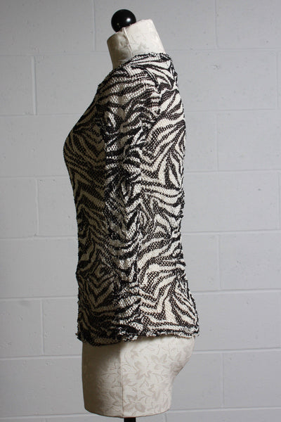 side view of black and white zebra print mesh tee shirt