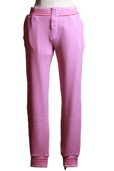 magenta ribbed thermal pant with a multi colored striped elastic waistband and ankle bands