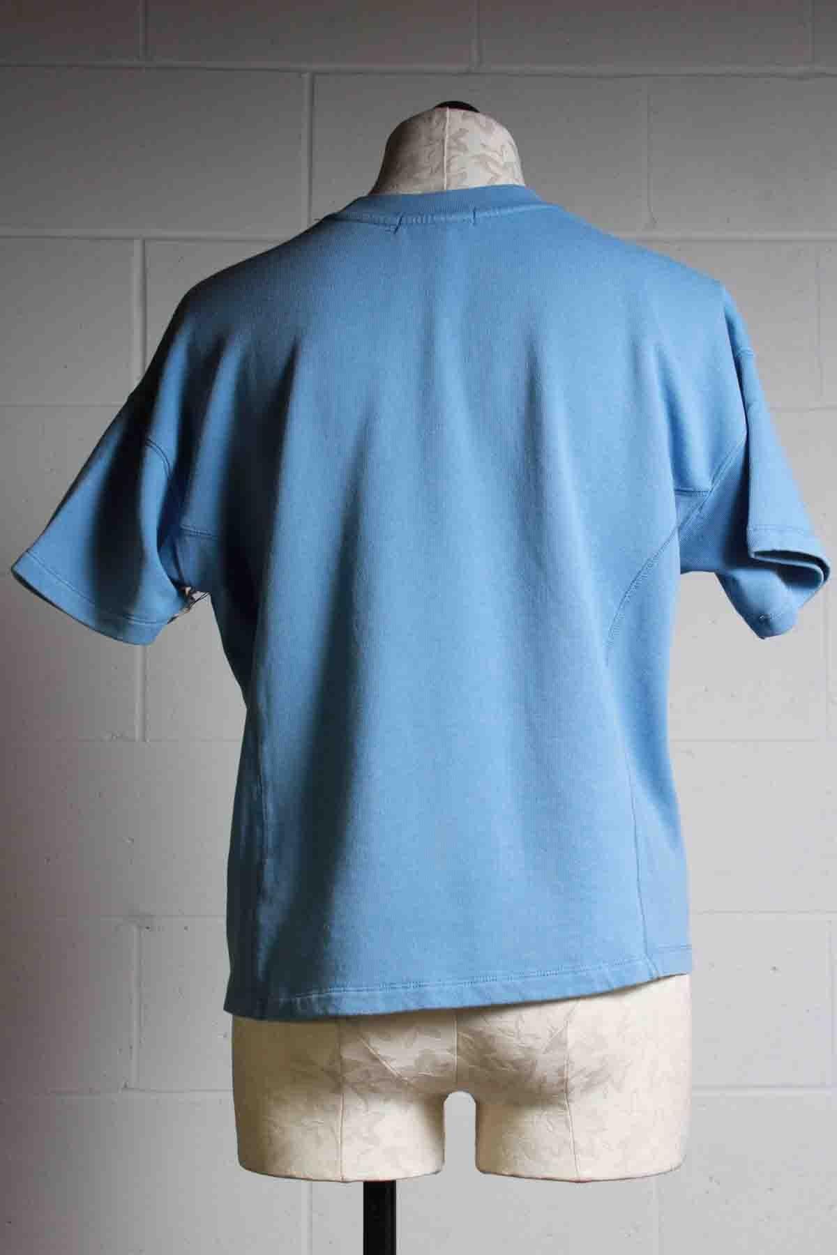 back view of Blue Short Sleeve Rocket Beach Tee-Sweatshirt by PJ Salvage with PARADISE written across the front