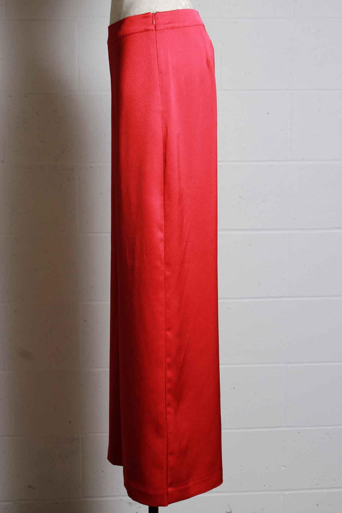 side view of ribbon red wide leg satin pant by Trina Turk with banded waist and concealed side zip
