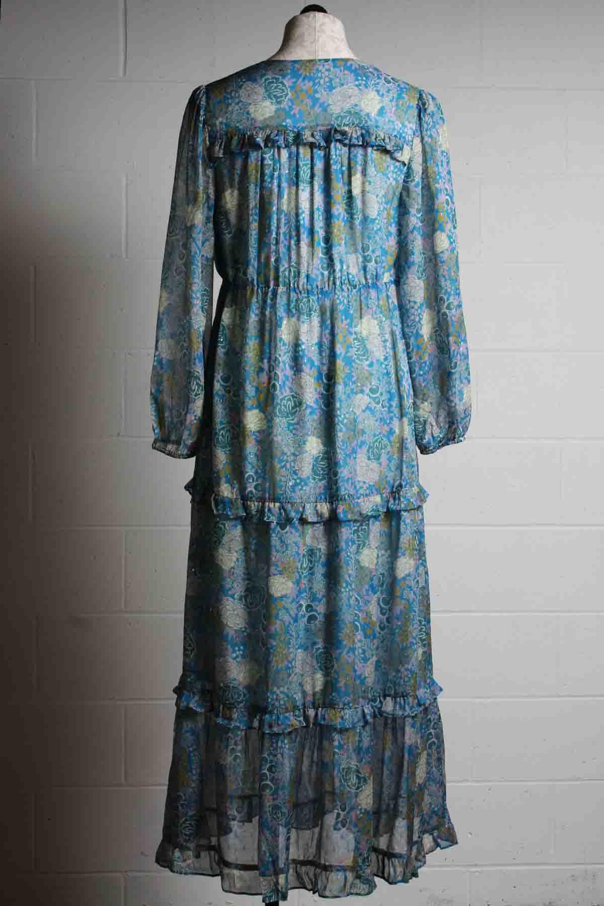 back view of Long Sleeve V Neck Periwinkle Blue Floral tiered Sadie Dress by Marie Oliver