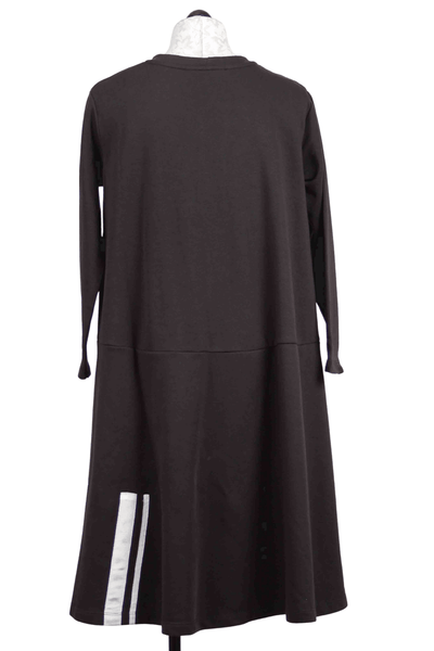 back view of black Long Sleeve Knit Dress by Alembika with Slouch Front Pockets with stripe detail on bottom side